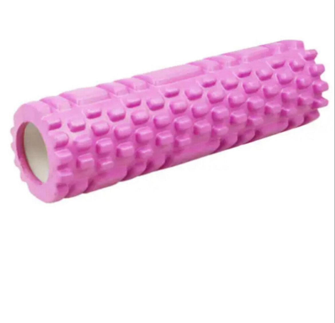 Roze foamroller voor spierherstel en massage