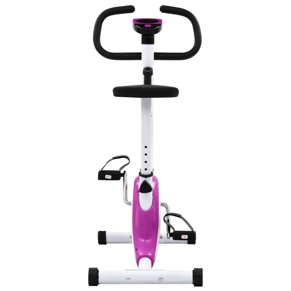 Stationaire hometrainer met een roze en wit frame en zwart stuur.