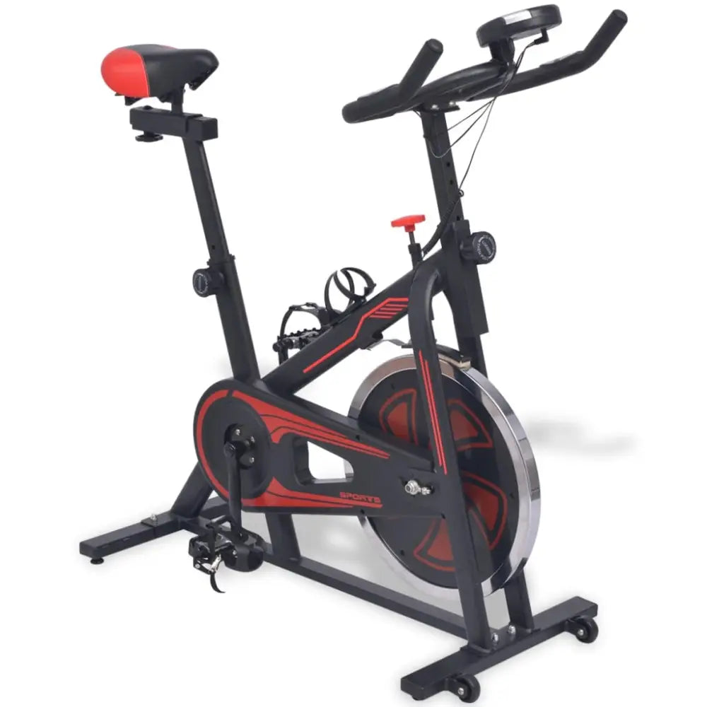 Stationaire hometrainer met zwart frame en rode accenten.