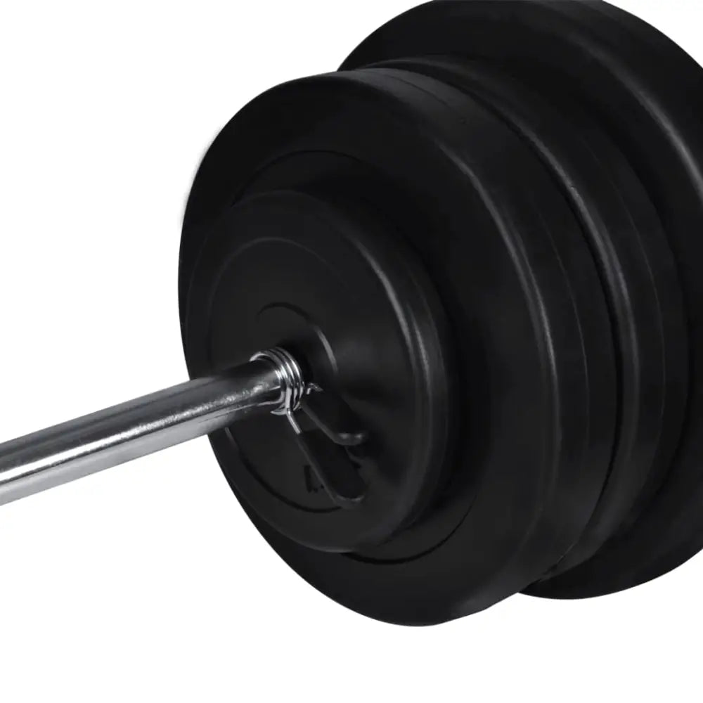 Barbell met zwarte halterschijven aan één uiteinde.